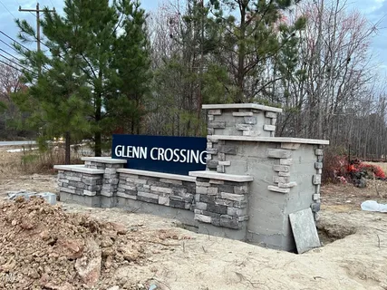 a view of a backyard of the house