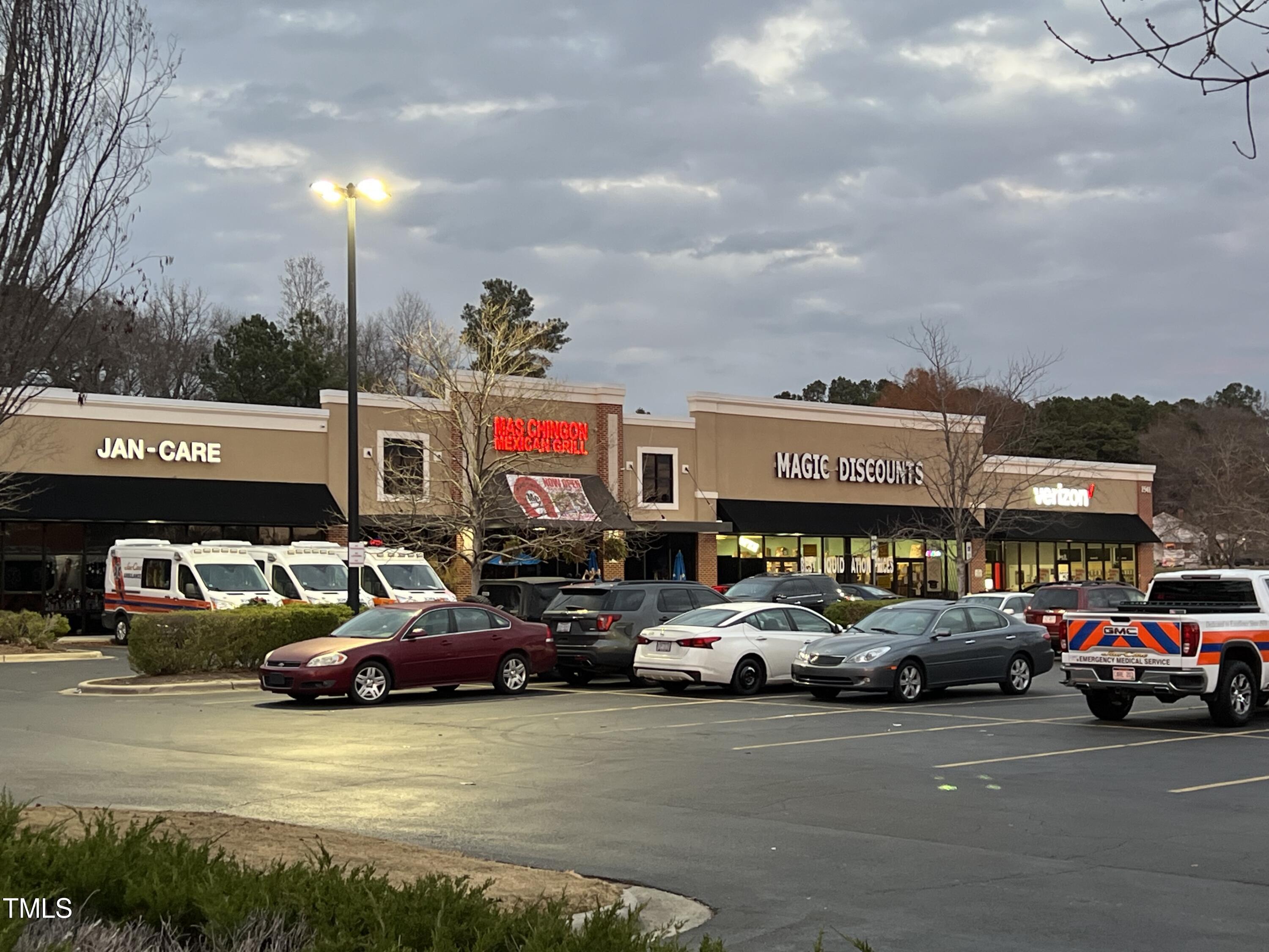 1720 Glenn School Road Durham, NC 27704 - Photo 9 of 10 a view of a cars park in front of a building