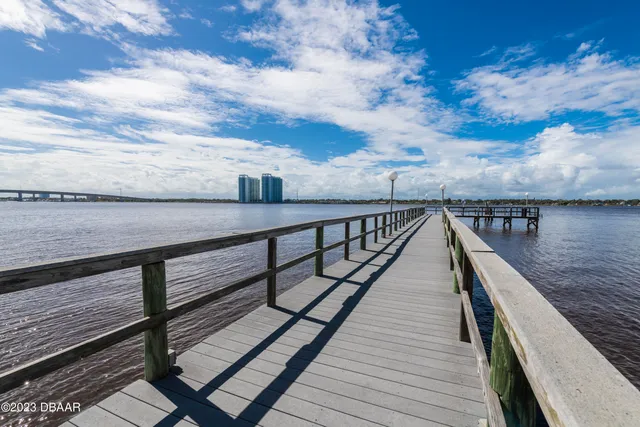 a view of wooden floor with a lake