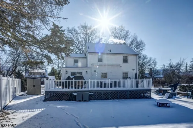 a view of a house with sitting area and furniture
