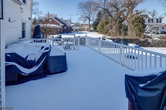 a view of a chairs and tables in the balcony