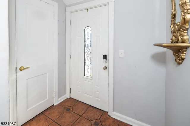 a view of a livingroom with wooden floor