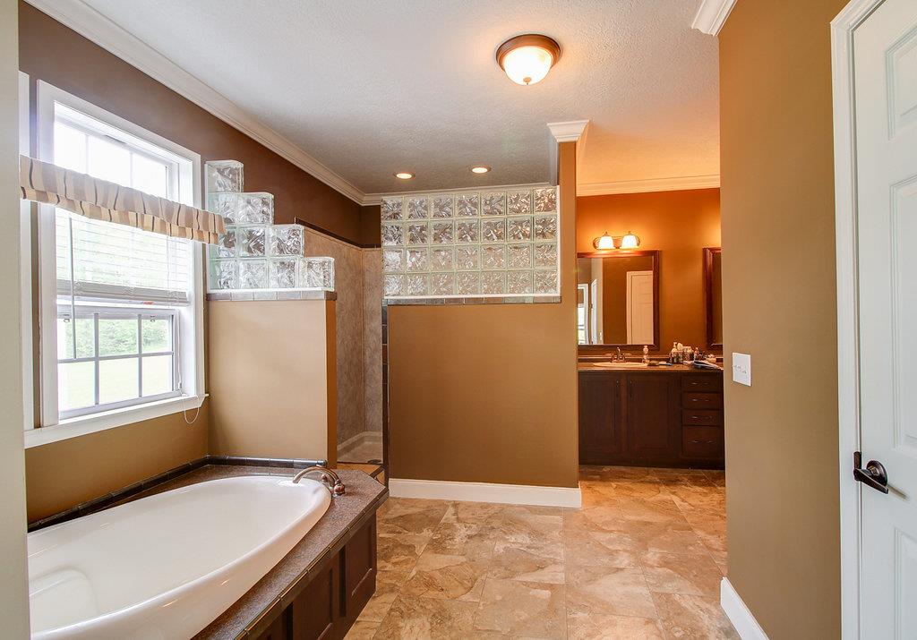 3720 Raleigh Beard Road Santa Fe, TN 38482 - Photo 11 of 18 a bathroom with a granite countertop sink and a mirror