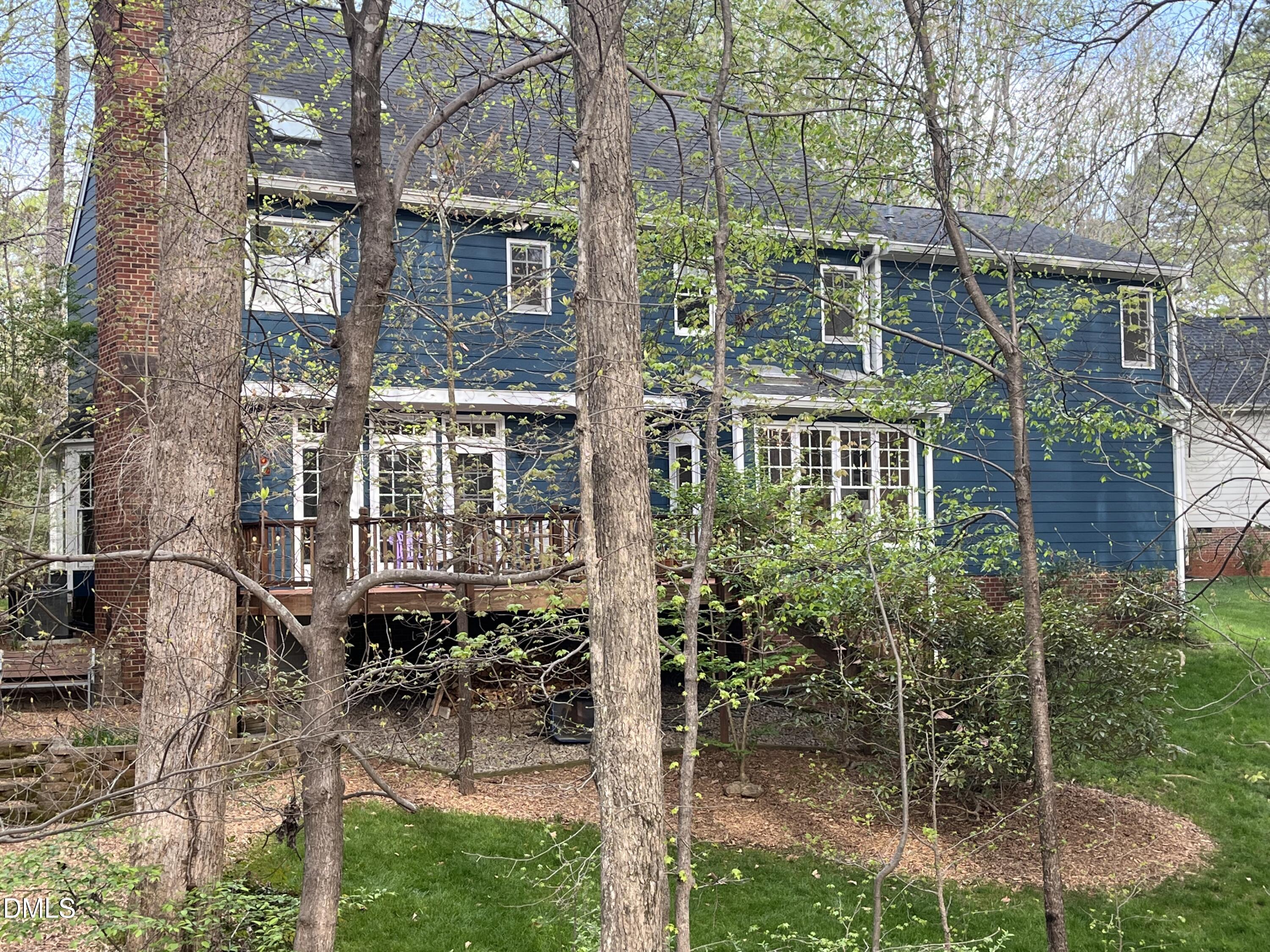 4001 Stemmons Court Raleigh, NC 27613 - Photo 3 of 45 a view of a house with backyard and sitting area