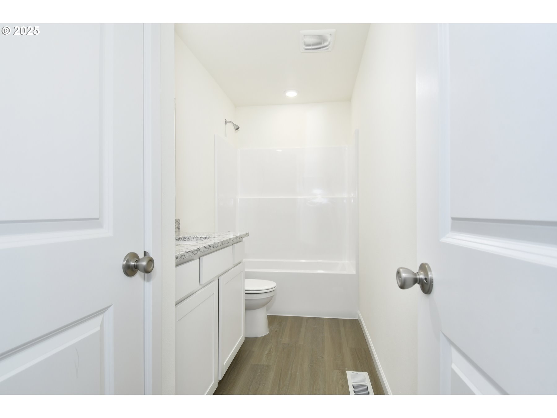 3990 Southwest Duniway Lane Gresham, OR 97080 - Photo 20 of 20 a bathroom with a sink a toilet a shower and a mirror