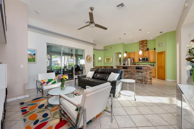 a living room with furniture and a table