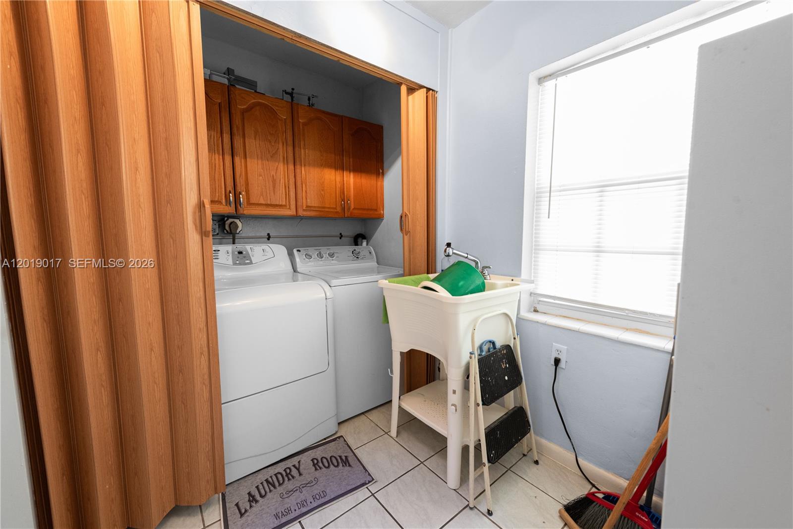 731 Northwest 17th Street Homestead, FL 33030 - Photo 15 of 29 a utility room with dryer and washer