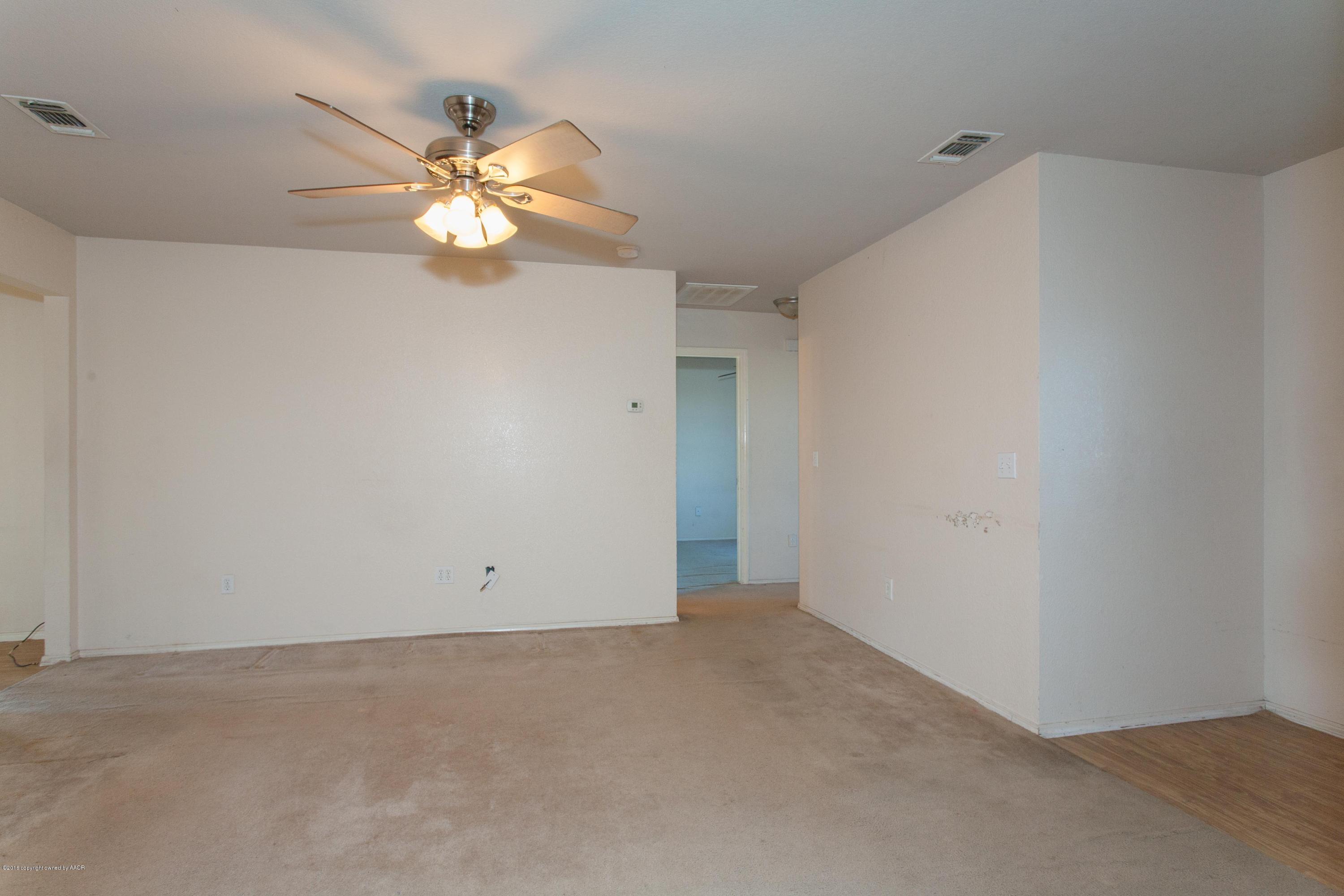 4810 Mammoth Lane Amarillo, TX 79110 - Photo 7 of 14 a view of an empty room with window