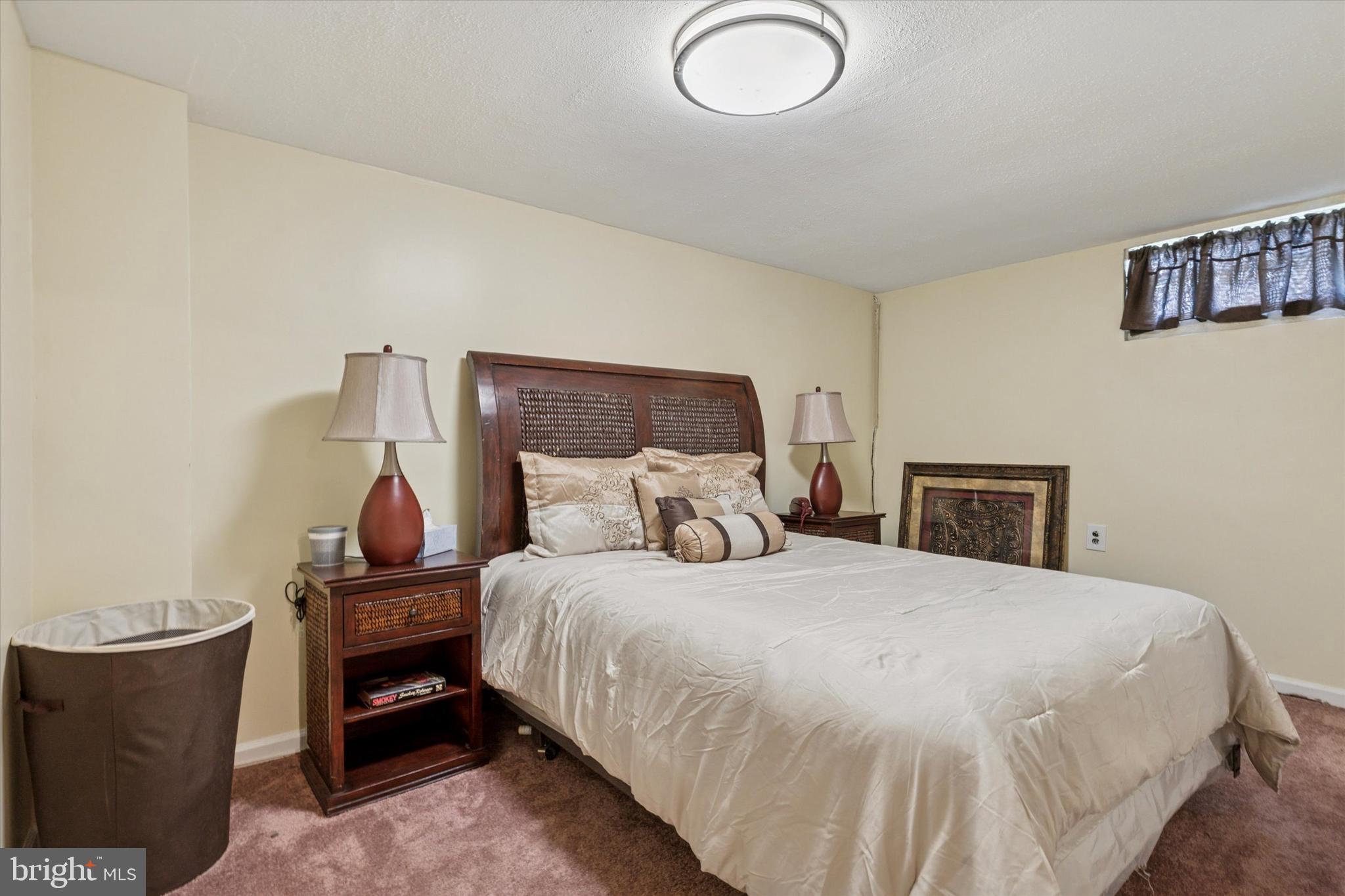 29 Harkfort Road Newark, DE 19702 - Photo 17 of 25 a bedroom with a bed and a window