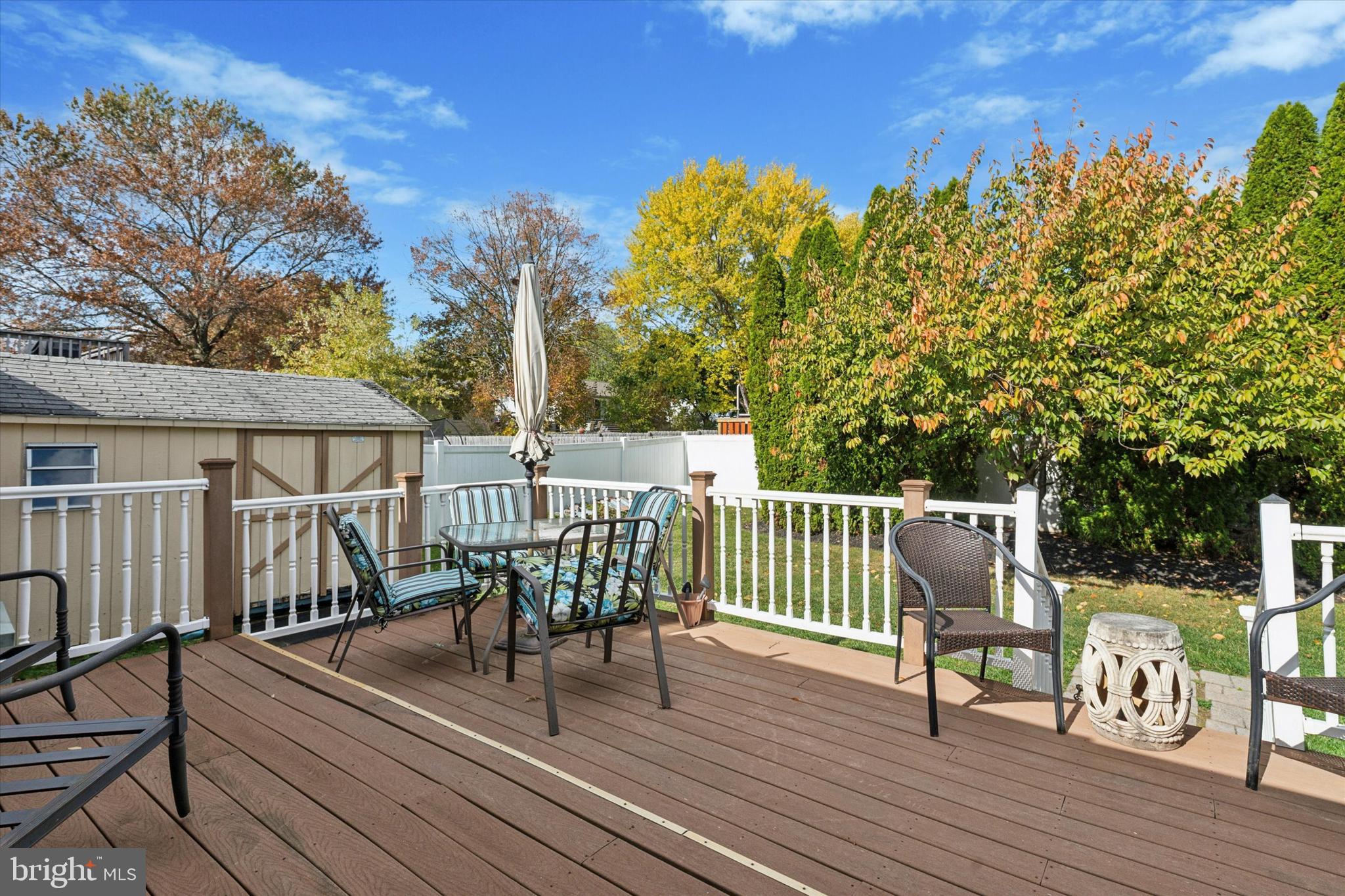 29 Harkfort Road Newark, DE 19702 - Photo 21 of 25 a view of a roof deck with table and chairs and wooden floor