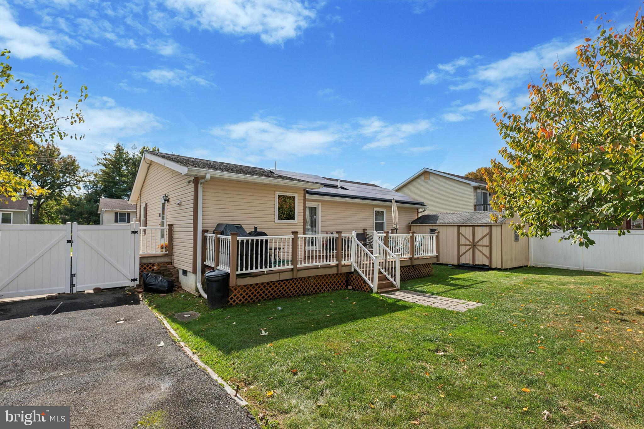 29 Harkfort Road Newark, DE 19702 - Photo 24 of 25 a view of a house with a yard and sitting area