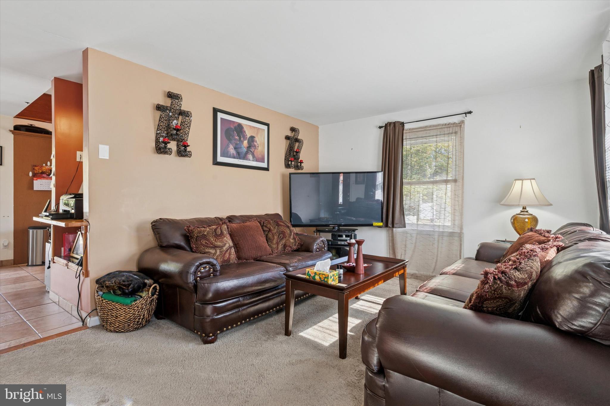 29 Harkfort Road Newark, DE 19702 - Photo 3 of 25 a living room with furniture a couch and a window