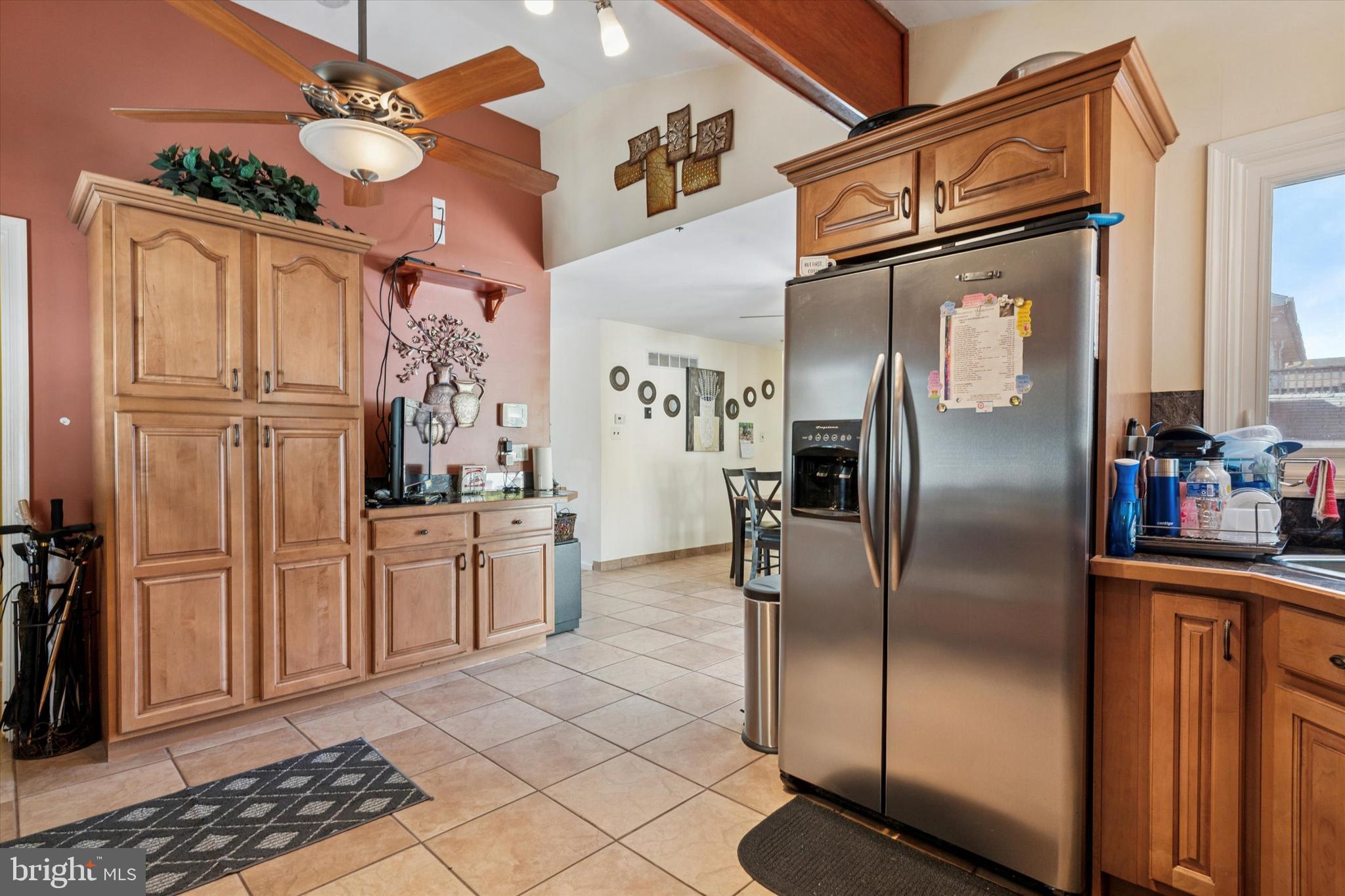 29 Harkfort Road Newark, DE 19702 - Photo 8 of 25 a kitchen with stainless steel appliances granite countertop a refrigerator a oven and white cabinets with wooden floor