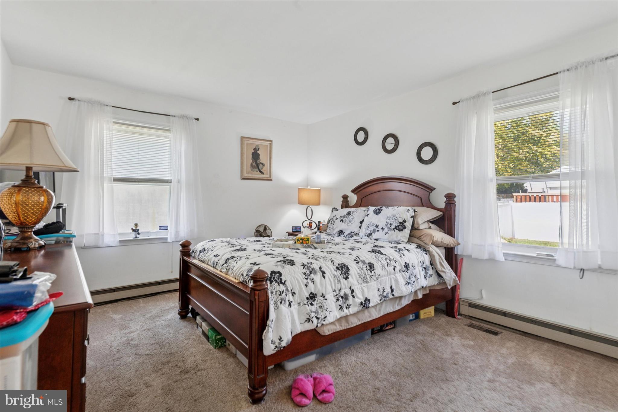 29 Harkfort Road Newark, DE 19702 - Photo 9 of 25 a bedroom with a bed and a window