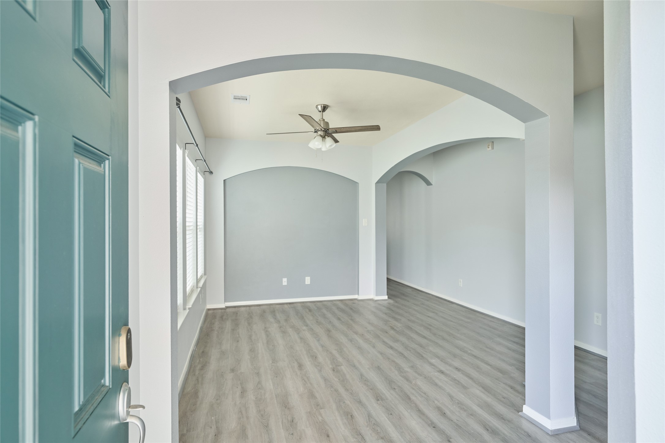 21718 Grassy Hill Lane Spring, TX 77388 - Photo 5 of 34 As soon as you enter the home, you are greeted by the living room area
