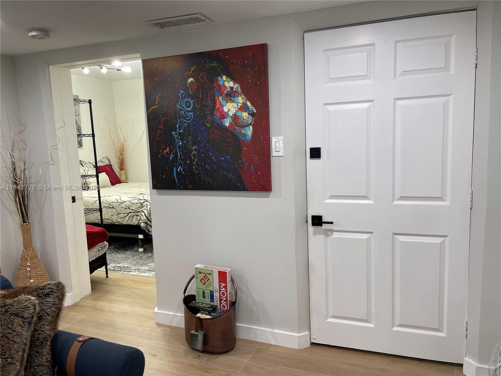 8525 Franjo Road, Unit 2 Cutler Bay, FL 33189 - Photo 3 of 23 a view of living room with furniture and a flat screen tv