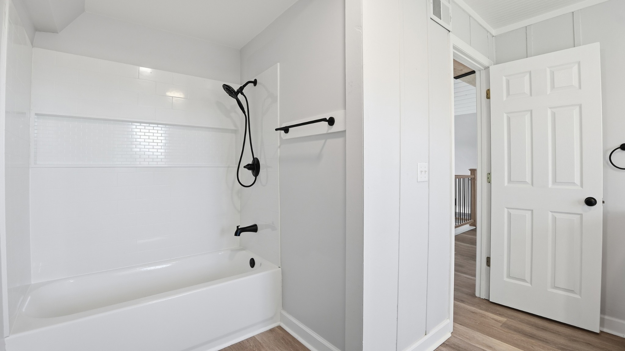 4669 Griffin Road Lynchburg, TN 37352 - Photo 19 of 43 a bathroom with a bathtub and a shower