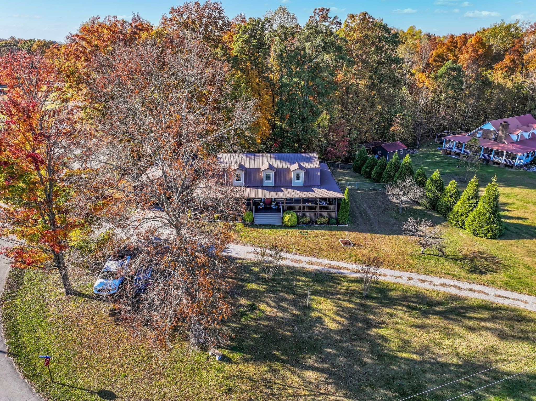 4669 Griffin Road Lynchburg, TN 37352 - Photo 37 of 43 a view of a swimming pool with a yard and plants