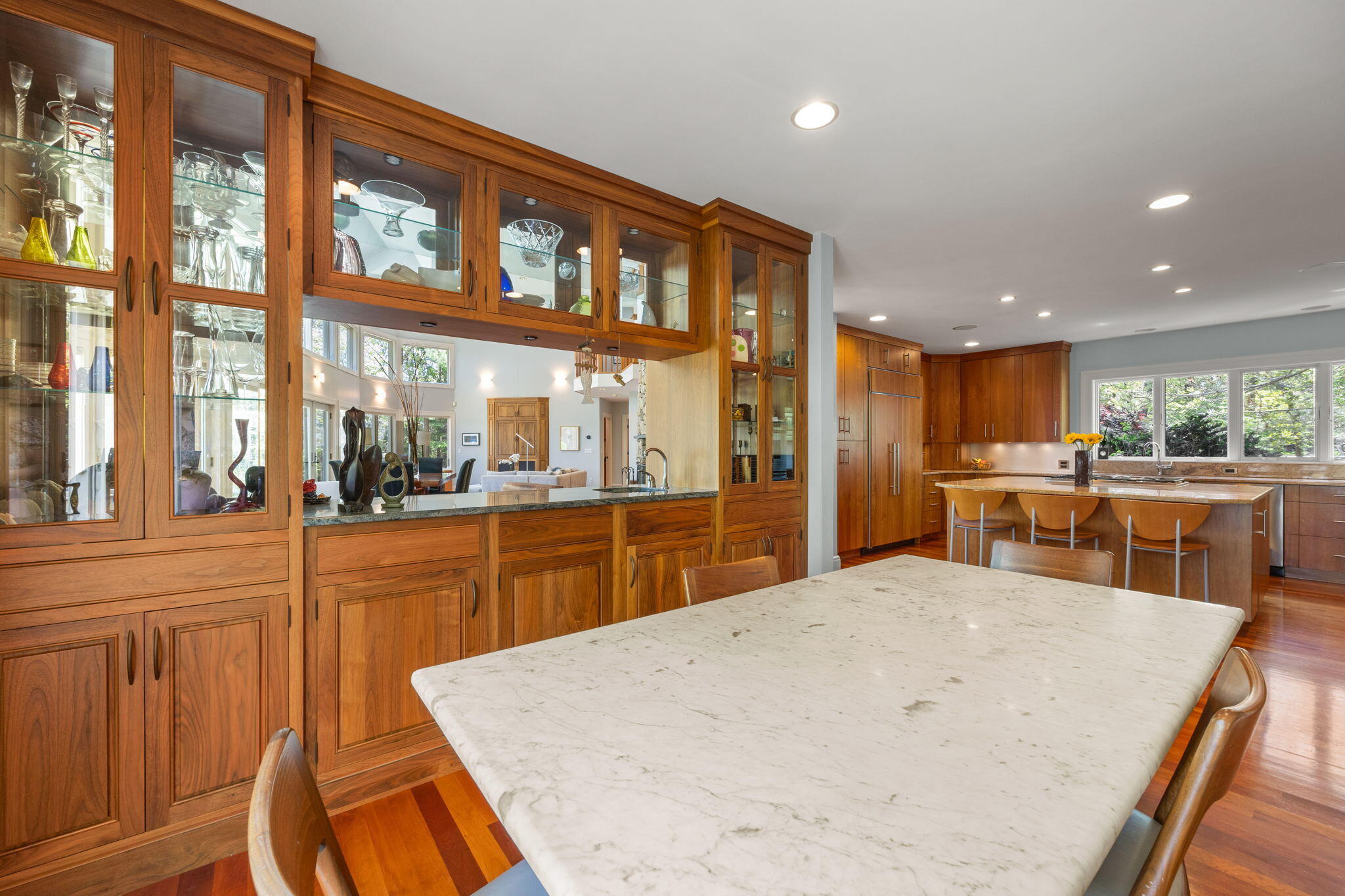 476 Baxter Neck Road Marstons Mills, MA 02648 - Photo 23 of 95 a kitchen with stainless steel appliances kitchen island granite countertop a refrigerator a stove and a sink with granite countertops