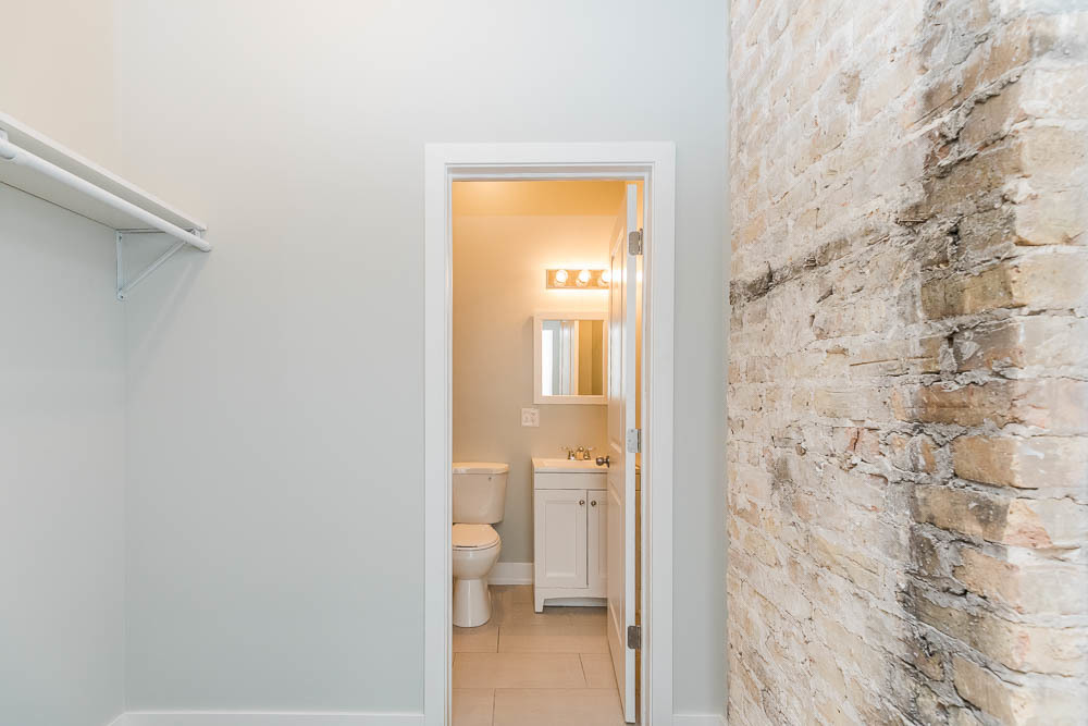 2228 West Cermak Road Chicago, IL 60608 - Photo 15 of 32 a bathroom with a toilet and a shower