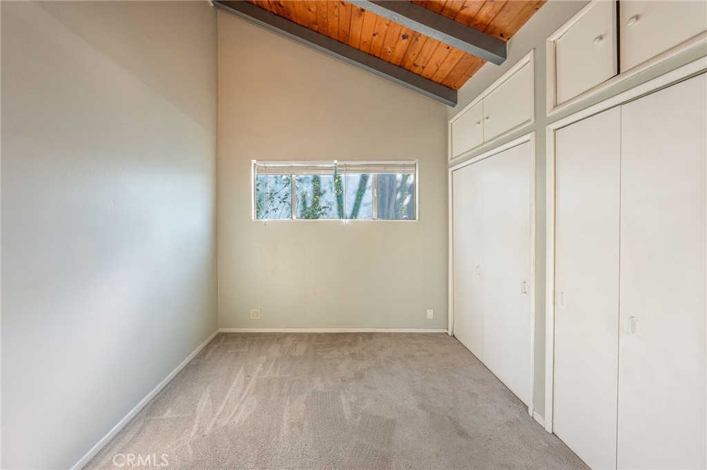 414 University Burbank, CA 91504 - Photo 12 of 18 a view of a small space with wooden floor and a window
