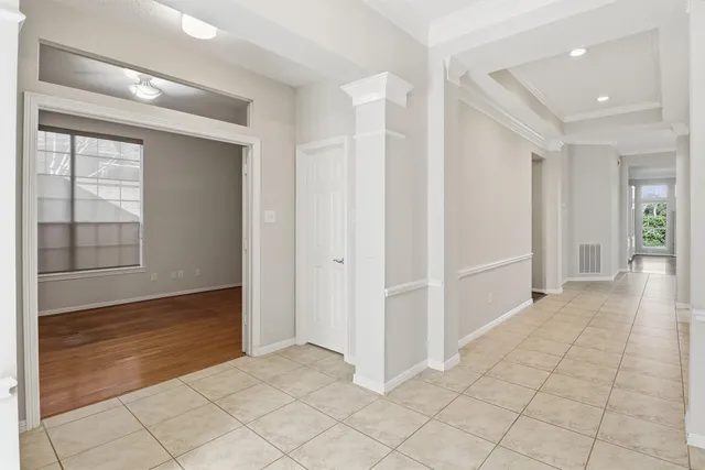 a kitchen with granite countertop a stove oven and a refrigerator
