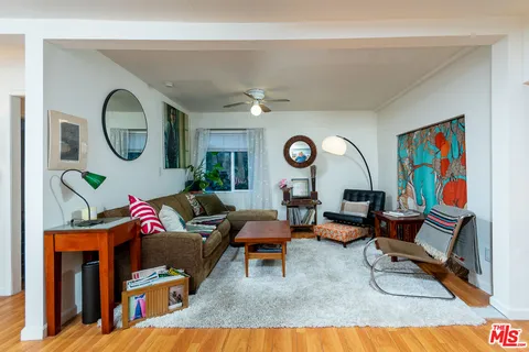 a kitchen with stainless steel appliances a stove top oven