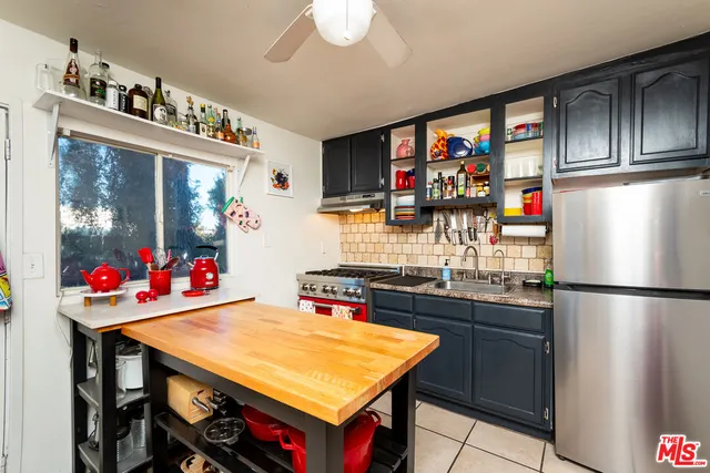 a view of a hallway with washer and dryer