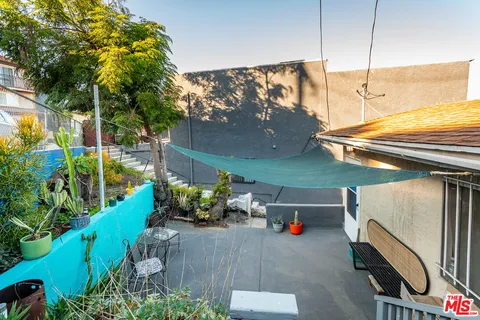 a backyard of a house with seating space