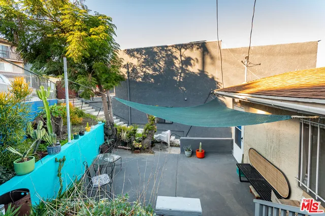 a backyard of a house with seating space