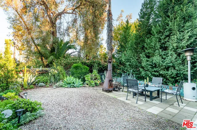 a view of a balcony with chairs