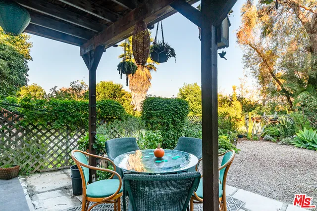 an aerial view of a house with a garden