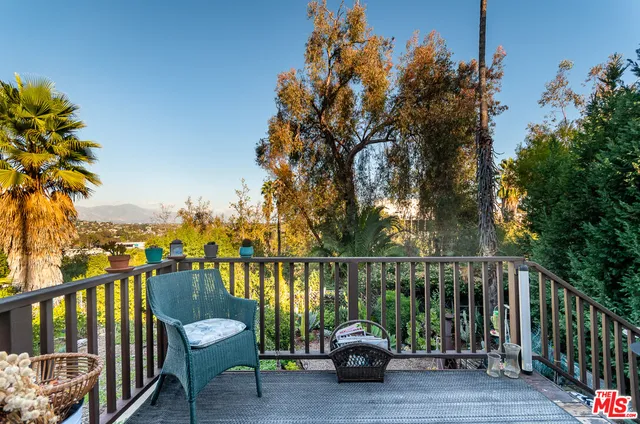 a picture of a bench in front of a door