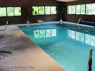 3590 Joe Ashton Road St. Augustine, FL 32092 - Photo 3 of 6 a view of swimming pool from a living room