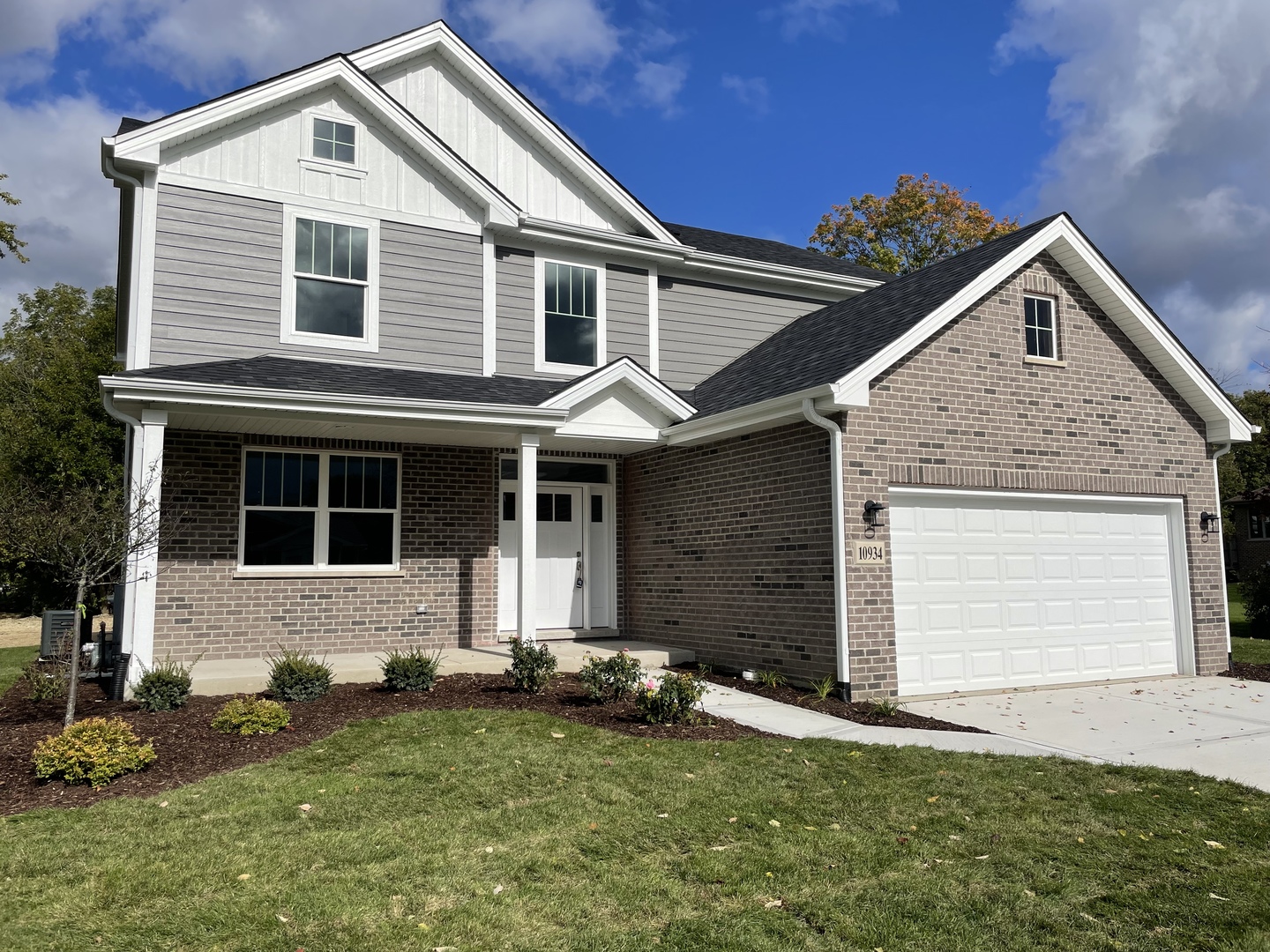 10934 Bryant Road Mokena, IL 60448 - Photo 1 of 24 a front view of a house with a yard