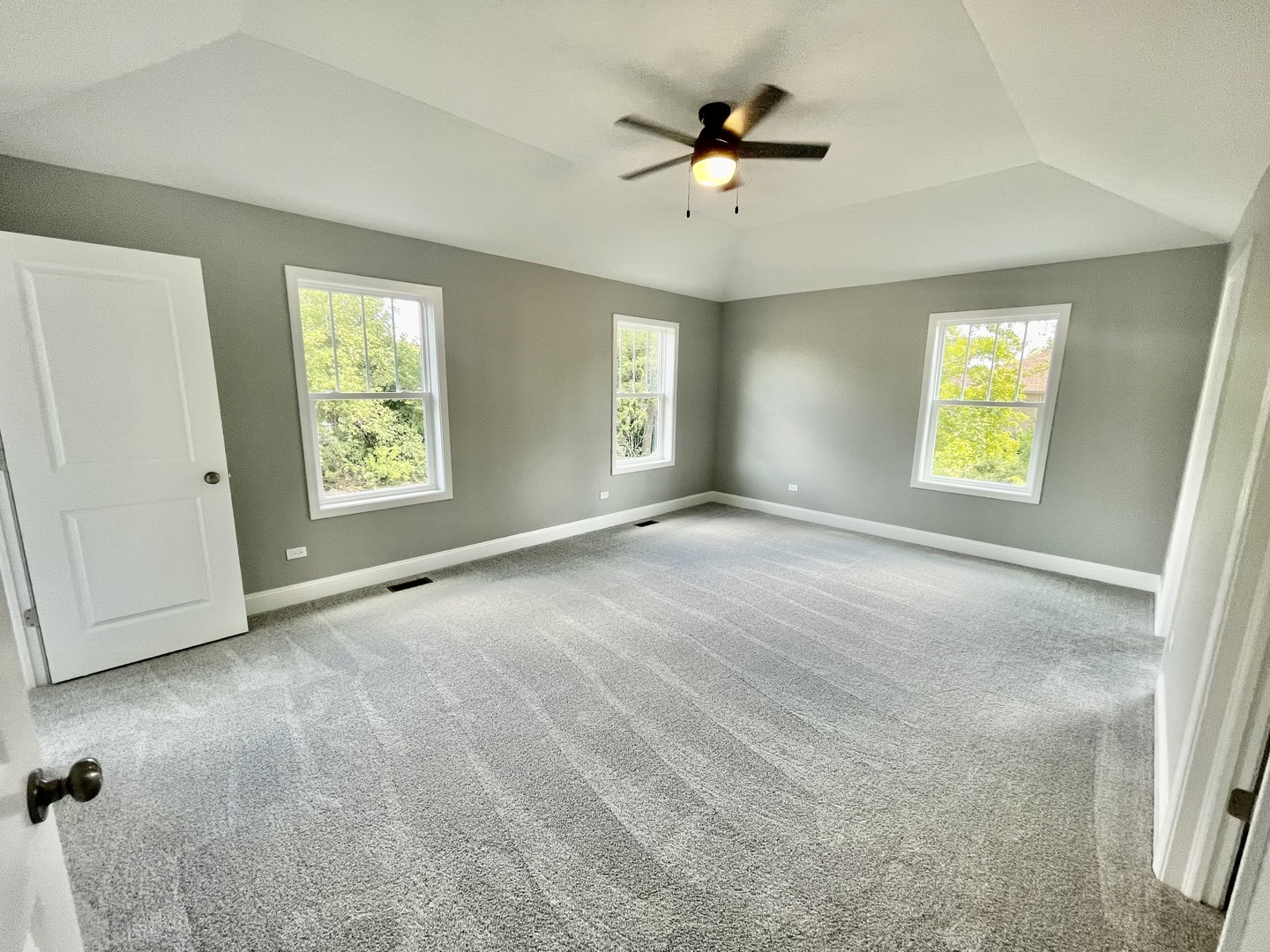 10934 Bryant Road Mokena, IL 60448 - Photo 15 of 24 an empty room with windows and fan