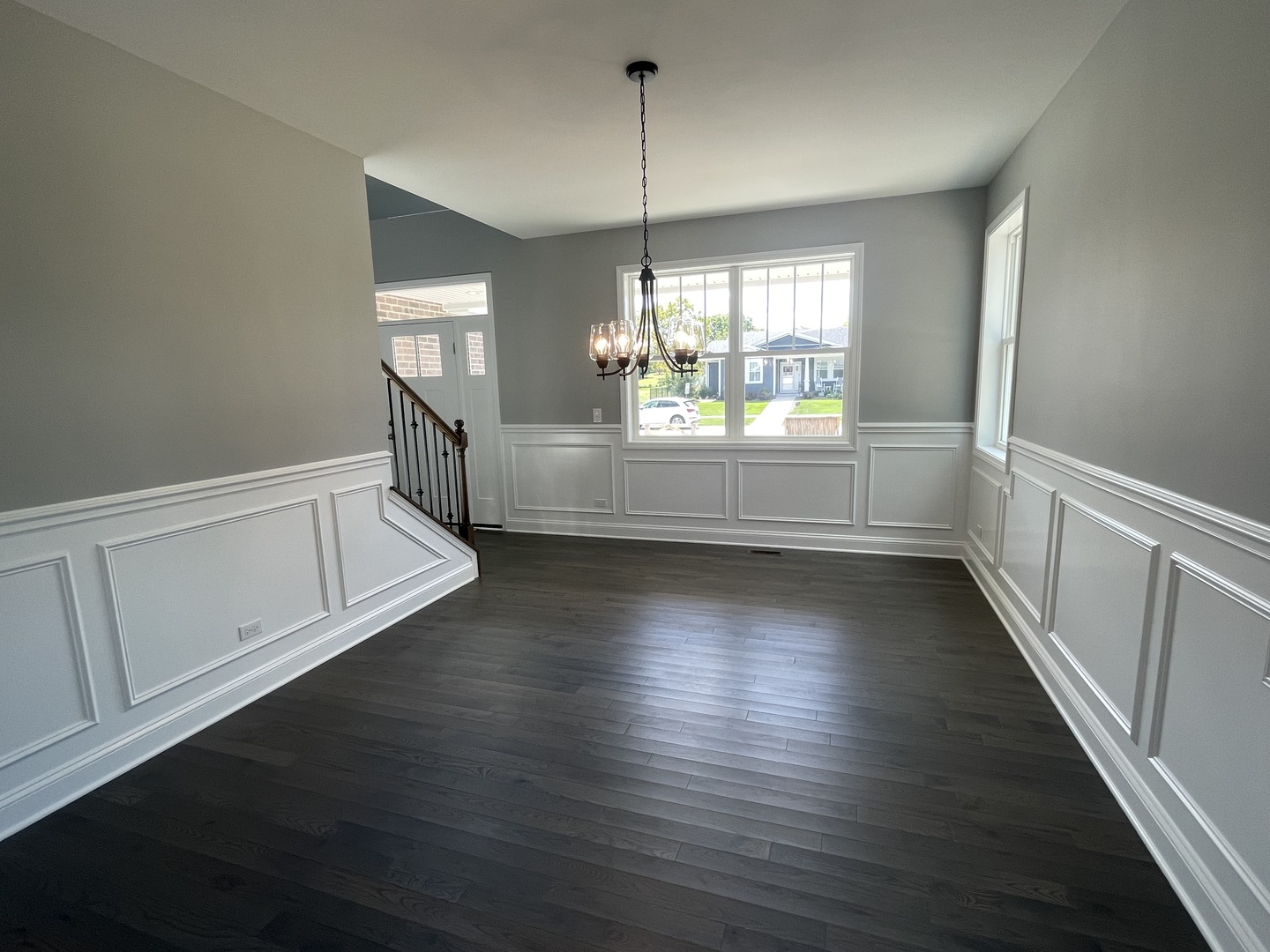10934 Bryant Road Mokena, IL 60448 - Photo 4 of 24 an empty room with wooden floor and windows