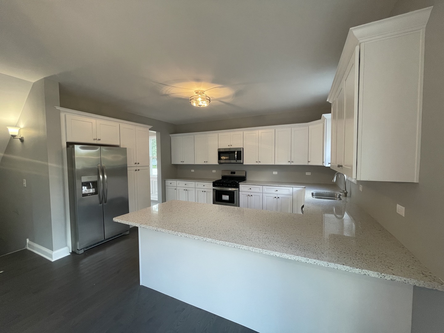 10934 Bryant Road Mokena, IL 60448 - Photo 7 of 24 a kitchen with a refrigerator and a sink
