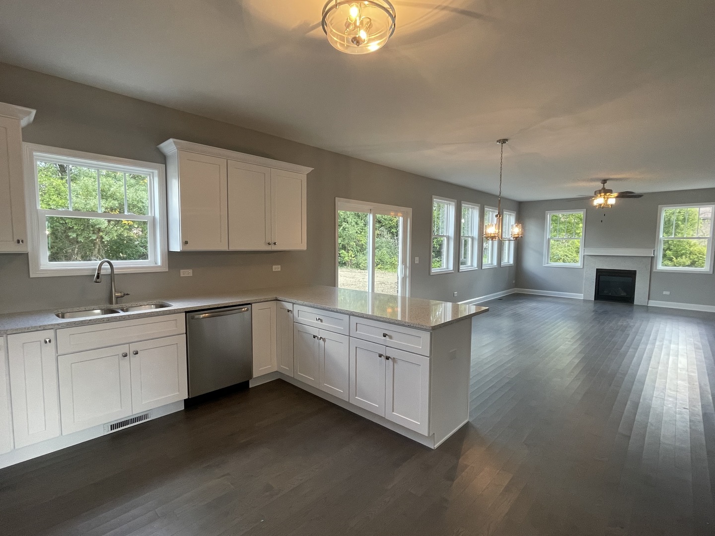10934 Bryant Road Mokena, IL 60448 - Photo 8 of 24 a large kitchen with a window and stainless steel appliances