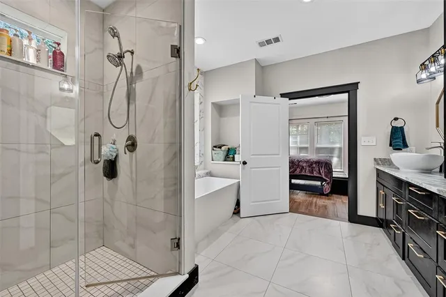 a view of a livingroom with a ceiling fan and window