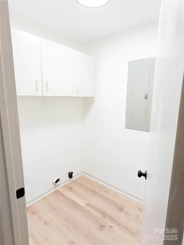 a close view of utility room with two and furniture