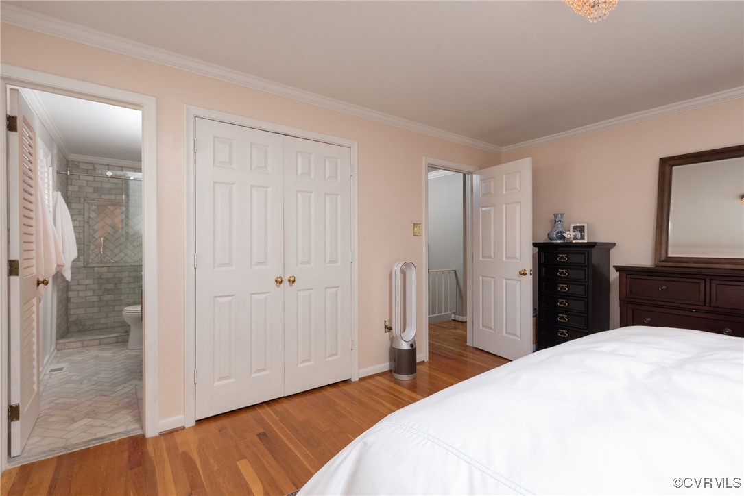 9111 Derbyshire Road, Unit I Henrico, VA 23229 - Photo 11 of 22 a bedroom with a bed and a dresser