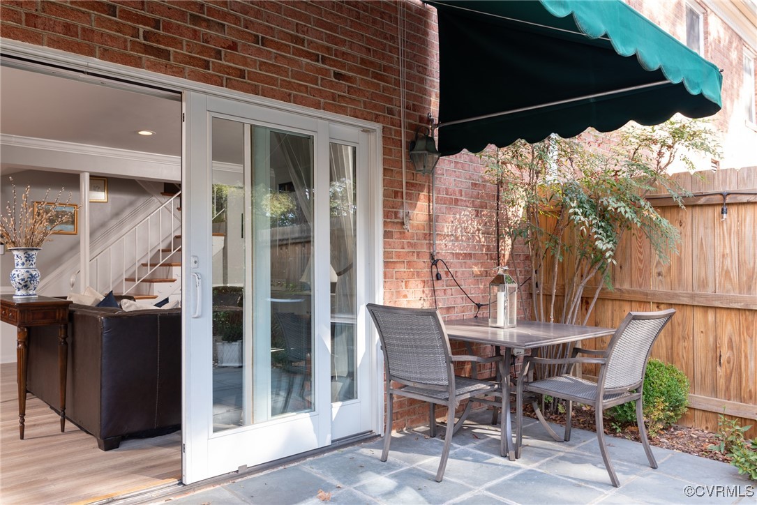 9111 Derbyshire Road, Unit I Henrico, VA 23229 - Photo 19 of 22 a view of a chairs and table in the patio
