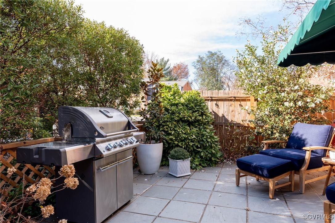 9111 Derbyshire Road, Unit I Henrico, VA 23229 - Photo 21 of 22 a view of an outdoor sitting area with fire pit