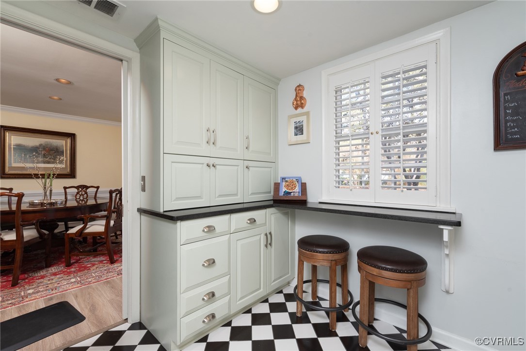 9111 Derbyshire Road, Unit I Henrico, VA 23229 - Photo 7 of 22 a kitchen with granite countertop a sink and a stove