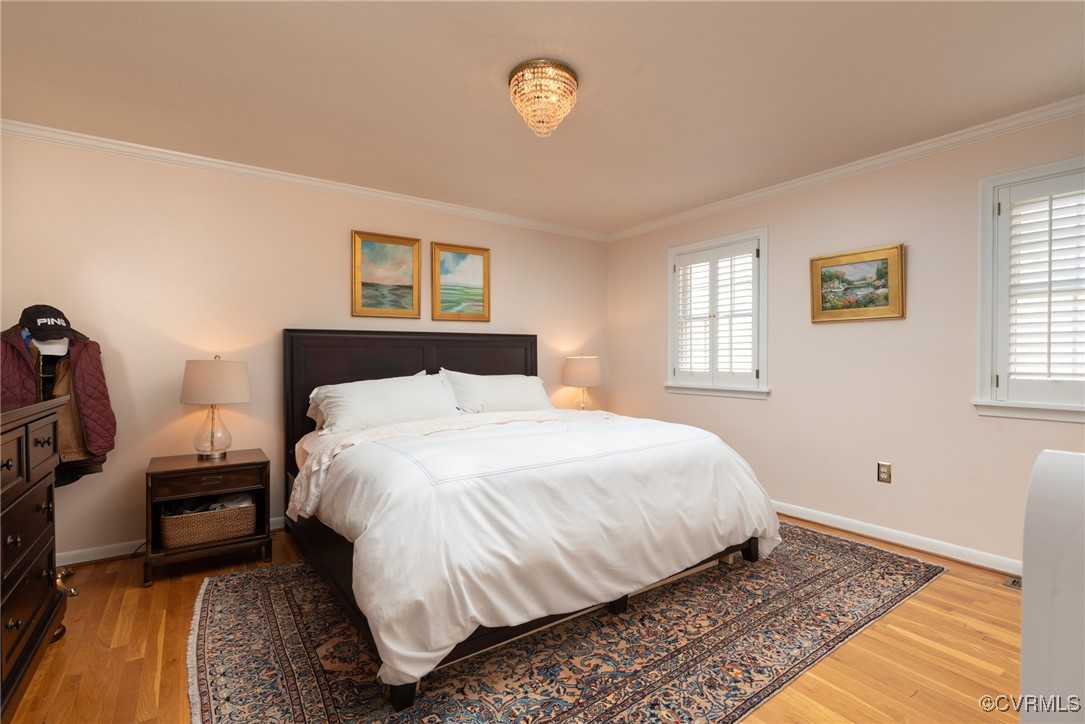 9111 Derbyshire Road, Unit I Henrico, VA 23229 - Photo 10 of 22 a bedroom with a bed and a window