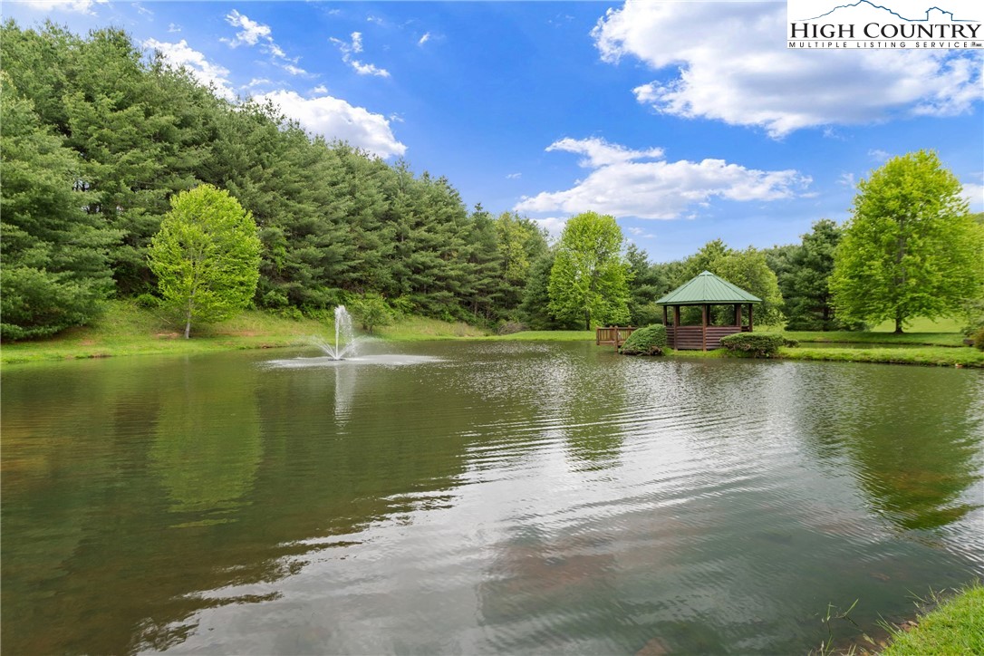 29 Pond View Lane Sparta, NC 28675 - Photo 16 of 27 a view of a lake with a yard