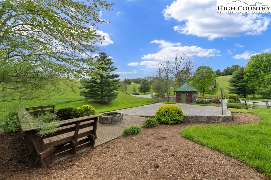 29 Pond View Lane Sparta, NC 28675 - Photo 18 of 27 a view of a bench in the garden