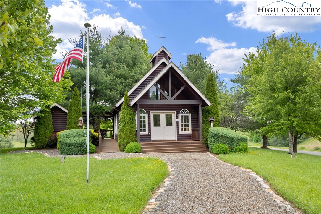 29 Pond View Lane Sparta, NC 28675 - Photo 19 of 27 a front view of a house with a yard