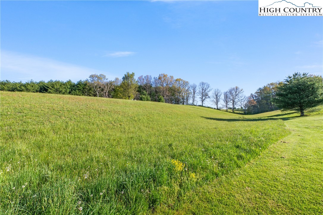 29 Pond View Lane Sparta, NC 28675 - Photo 23 of 27 a view of a field with an ocean